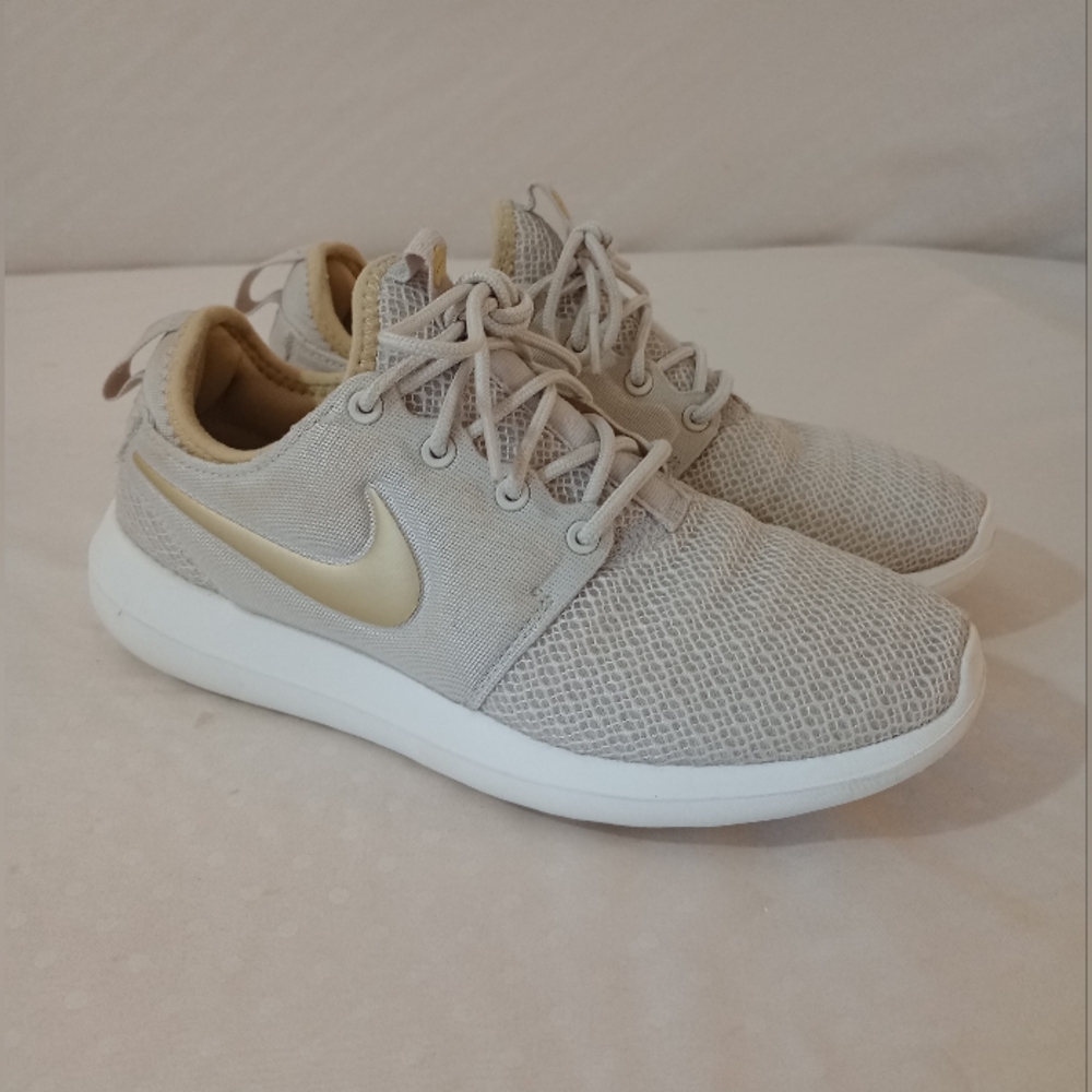 Nike Beige Sneakers with Gold Swoosh